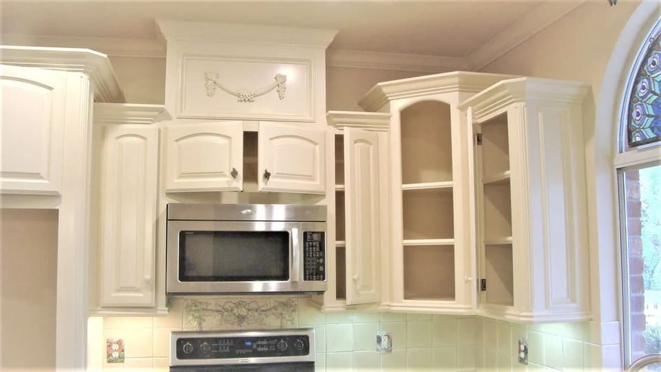 Kitchen cabinets painted white in a Mustang, OK home
