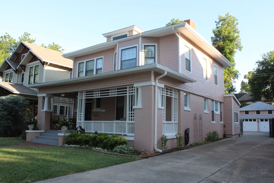 Exterior painting on a historic home in Mesta Park, OKC